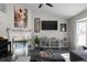 Inviting living room with a fireplace, high ceilings, and stylish furnishings at 70 Nw Willow Bend Dr, Cartersville, GA 30121