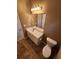 Bathroom featuring a vanity with ample storage and a mirror at 959 Gettysburg Way, Locust Grove, GA 30248