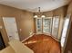 Bright breakfast nook area with hardwood floors and lots of natural light at 959 Gettysburg Way, Locust Grove, GA 30248