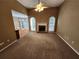 Spacious living room featuring a cozy fireplace and an abundance of natural light at 959 Gettysburg Way, Locust Grove, GA 30248