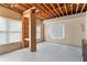 Unfinished basement with exposed ceiling and ductwork, and windows for natural light at 118 Fairway Overlook Dr, Acworth, GA 30101