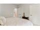 Neutral bedroom with bedside table, and soft lighting at 118 Fairway Overlook Dr, Acworth, GA 30101