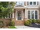 Charming front entrance with stone steps, a stylish front door, and manicured landscaping at 118 Fairway Overlook Dr, Acworth, GA 30101