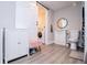 Updated bathroom featuring a sliding barn door, modern vanity, and white fixtures at 185 Whetstone Way, Villa Rica, GA 30180