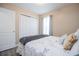 Comfortable bedroom features closet and window for ample storage space and light at 185 Whetstone Way, Villa Rica, GA 30180