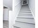 White staircase leading upstairs at 185 Whetstone Way, Villa Rica, GA 30180