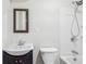 Bathroom features a vanity, toilet, and walk-in shower at 2248 Bethel Rd, Conyers, GA 30012