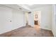 Bedroom featuring a doorway leading to a bathroom at 2248 Bethel Rd, Conyers, GA 30012