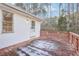 Wood deck featuring railings and door to the house, with snow visible on the floor at 2248 Bethel Rd, Conyers, GA 30012