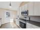 Bright kitchen equipped with sleek stainless steel appliances and modern countertops at 2248 Bethel Rd, Conyers, GA 30012