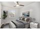 Relaxing bedroom with natural light, neutral colors and hardwood floors at 2760 Swansea Ct, College Park, GA 30349