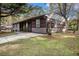 Exterior view of the home showcasing a clean sidewalk, neutral paint, and curb appeal at 2760 Swansea Ct, College Park, GA 30349