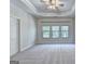 Spacious bedroom with tray ceiling and large windows at 2790 Laurel Valley Trl, Buford, GA 30519