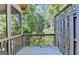 View of the open air deck area, featuring a view of the surrounding trees at 2790 Laurel Valley Trl, Buford, GA 30519