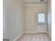 Empty room with carpet, neutral walls, and a door leading outside at 2790 Laurel Valley Trl, Buford, GA 30519