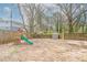 Backyard featuring playset, a shed, and wood privacy fence at 3040 Washington Rd, Atlanta, GA 30344