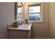 Bathroom featuring a decorative vanity with marble countertop and stylish finishes at 3601 Orchard Cir, Decatur, GA 30032