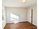 Bedroom with hardwood floors and white trim detail at 3601 Orchard Cir, Decatur, GA 30032