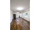 Bright living room with luxury vinyl plank flooring and a seamless flow into the kitchen area at 3601 Orchard Cir, Decatur, GA 30032