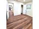 Bedroom featuring hardwood floors, closet and open door view of living room at 2182 Rosewood Rd, Decatur, GA 30032