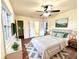 Well appointed main bedroom with hardwood floors and window light at 2182 Rosewood Rd, Decatur, GA 30032