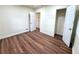 Bedroom featuring hardwood floors, closet and open door view at 2182 Rosewood Rd, Decatur, GA 30032