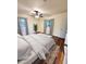 Bedroom featuring hardwood floors, large windows, and soft natural light at 2182 Rosewood Rd, Decatur, GA 30032