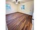 Bright bedroom with hardwood floors, ceiling fan, and natural light at 2182 Rosewood Rd, Decatur, GA 30032