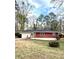 Exterior view of brick and siding home; well maintained and landscaped yard at 2182 Rosewood Rd, Decatur, GA 30032