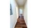 Hallway with hardwood floors showing access to other rooms at 2182 Rosewood Rd, Decatur, GA 30032