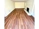 Spacious living room featuring hardwood floors and a fireplace at 2182 Rosewood Rd, Decatur, GA 30032