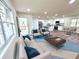 Modern open living space with stylish furniture flowing into bright kitchen at 2182 Rosewood Rd, Decatur, GA 30032