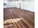 Spacious living room featuring newly installed hardwood floors and neutral paint at 2182 Rosewood Rd, Decatur, GA 30032