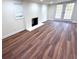 Living room with fireplace and wood flooring at 2182 Rosewood Rd, Decatur, GA 30032