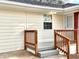 Inviting porch with wooden railing and steps, adds a touch of charm to the front of the house at 2182 Rosewood Rd, Decatur, GA 30032