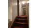 Interior shot of a carpeted staircase leading to the second story of the home at 3315 Canterbury Trl, Rex, GA 30273