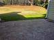 View of spacious backyard with tree house and playset from patio area at 3650 Burnt Hickory Dr, Dacula, GA 30019