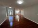 Bright living room with hardwood floors and decorative trim at 3650 Burnt Hickory Dr, Dacula, GA 30019