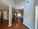 Open concept living space featuring hardwood floors and neutral paint at 3650 Burnt Hickory Dr, Dacula, GA 30019