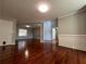 Spacious living room featuring hardwood floors and great natural light at 3650 Burnt Hickory Dr, Dacula, GA 30019