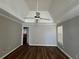 Spacious main bedroom with vaulted ceiling, ceiling fan, and light colored walls at 3650 Burnt Hickory Dr, Dacula, GA 30019