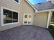 Exterior patio area featuring durable flooring, access to the home with double glass doors at 3650 Burnt Hickory Dr, Dacula, GA 30019