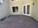 Exterior patio featuring access to the home with white trimmed doors and a spacious backyard at 3650 Burnt Hickory Dr, Dacula, GA 30019