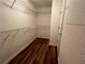 Walk-in closet featuring shelving and ample storage space at 3650 Burnt Hickory Dr, Dacula, GA 30019