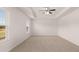 Bedroom featuring tray ceilings, natural light and neutral-colored carpeting at 656 Kimberwick Dr, Locust Grove, GA 30248