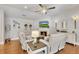 Comfortable living room with a fireplace, modern lighting, and neutral color palette at 226 Patti Pl, Canton, GA 30114