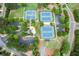 Aerial view of the community tennis courts and surrounding grounds at 226 Patti Pl, Canton, GA 30114