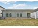 This home has a level backyard with a small patio and partial cover at 3954 Brushy St, Powder Springs, GA 30127