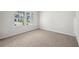 This bedroom has two bright windows and plush carpeting at 3954 Brushy St, Powder Springs, GA 30127