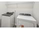 Laundry room featuring a washer and dryer at 3954 Brushy St, Powder Springs, GA 30127